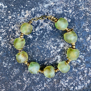 Earth Coloured Recycled Glass Bracelet: Sustainable, eco-friendly jewellery crafted from recycled glass in earth-inspired hues. Adjustable design for versatile styling. Embrace ethical fashion with this nature-inspired and environmentally-conscious accessory.