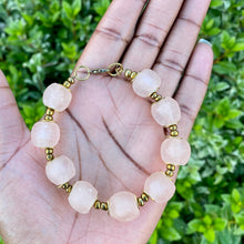 Load image into Gallery viewer, Blush Pink Recycled Glass Bracelet: Sustainable and stylish eco-friendly jewellery made from recycled glass, showcasing a delicate blush pink hue. Adjustable design for a comfortable fit. Perfect for ethical fashion enthusiasts. Shop now for a greener accessory
