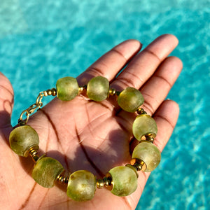 Earth Recycled Glass Bracelet: Sustainable, eco-friendly jewellery featuring handcrafted beads in earthy tones. Adjustable design for versatile styling. Embrace ethical fashion with this nature-inspired and environmentally-conscious accessory.